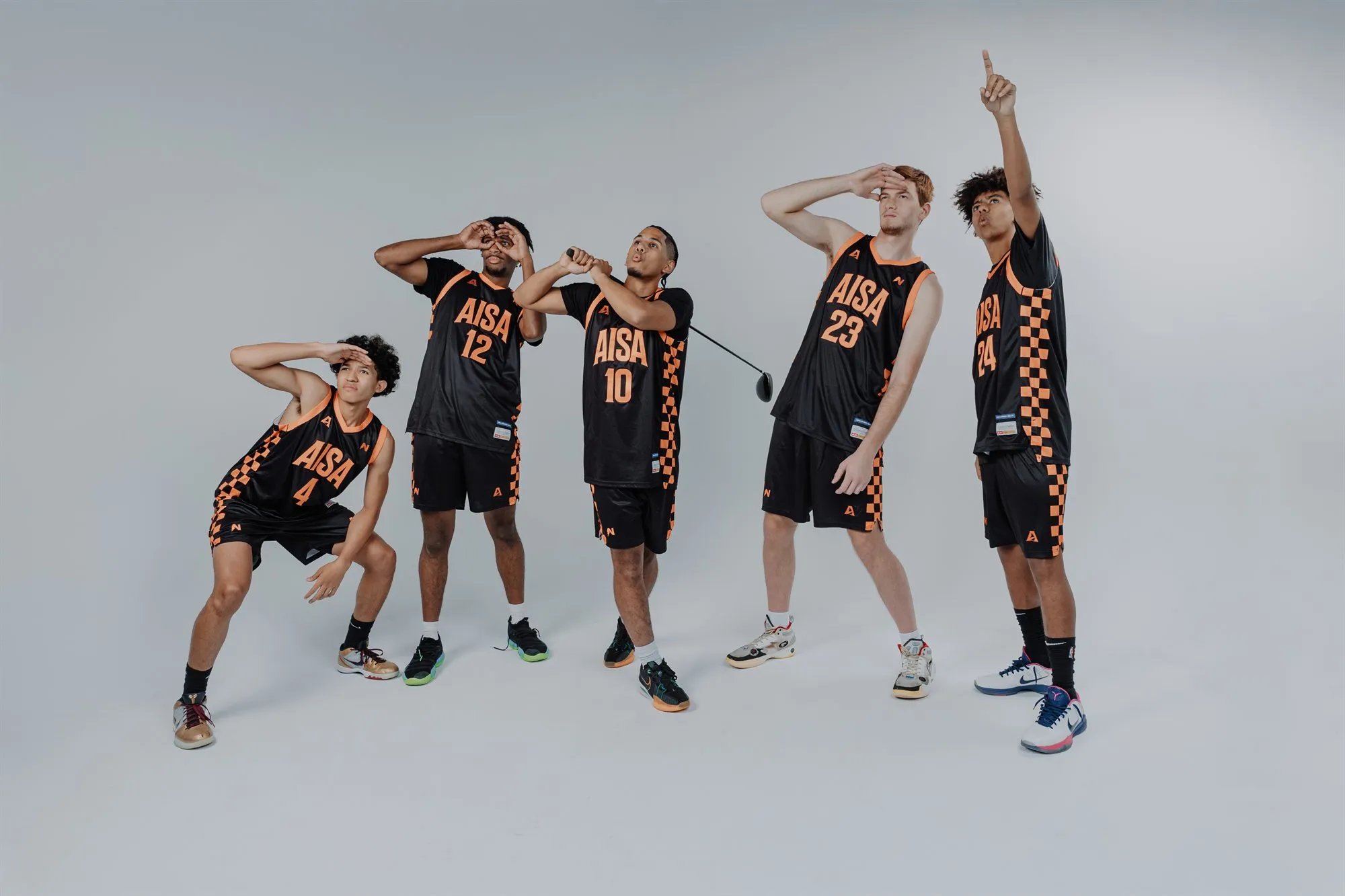 AISA squad in black and orange uniforms